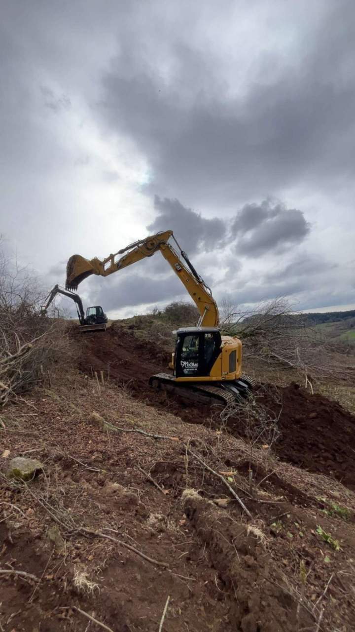 Reprofilage d'une piste forestière Rochefort Montagne